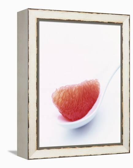 Grapefruit Segment on White Spoon-Peter Medilek-Framed Premier Image Canvas