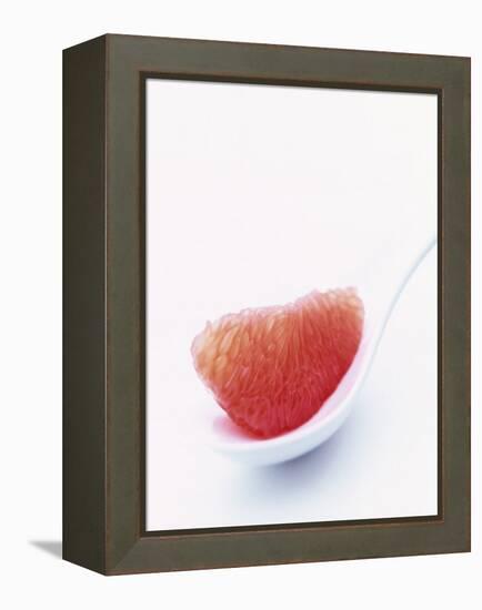Grapefruit Segment on White Spoon-Peter Medilek-Framed Premier Image Canvas