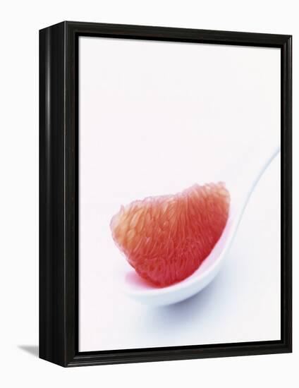 Grapefruit Segment on White Spoon-Peter Medilek-Framed Premier Image Canvas