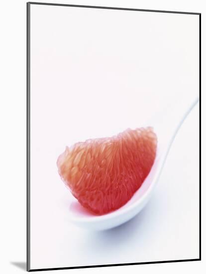 Grapefruit Segment on White Spoon-Peter Medilek-Mounted Photographic Print