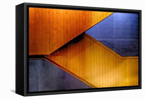 Graphic Composition of Orange Stairs Against a Blue Wall-Rona Schwarz-Framed Premier Image Canvas