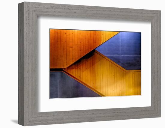 Graphic Composition of Orange Stairs Against a Blue Wall-Rona Schwarz-Framed Photographic Print