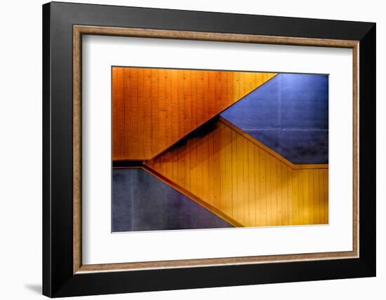 Graphic Composition of Orange Stairs Against a Blue Wall-Rona Schwarz-Framed Photographic Print