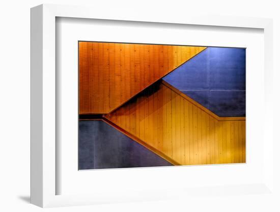 Graphic Composition of Orange Stairs Against a Blue Wall-Rona Schwarz-Framed Photographic Print