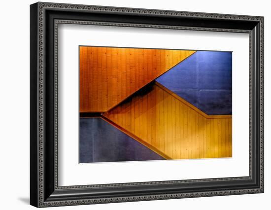 Graphic Composition of Orange Stairs Against a Blue Wall-Rona Schwarz-Framed Photographic Print