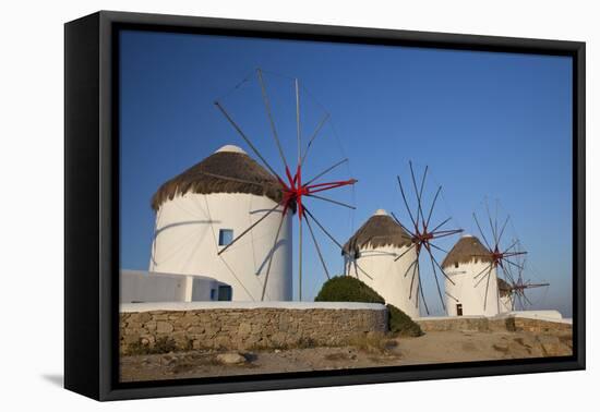 Greece, Mykonos. Windmills along the water-Hollice Looney-Framed Premier Image Canvas