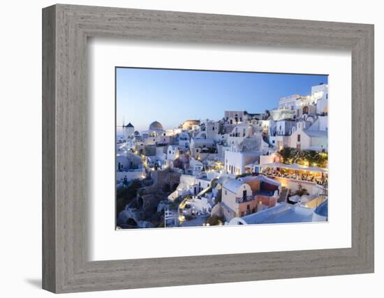 Greece, Santorini, Oia. white buildings and steep mountains at sunset.-Bill Bachmann-Framed Photographic Print