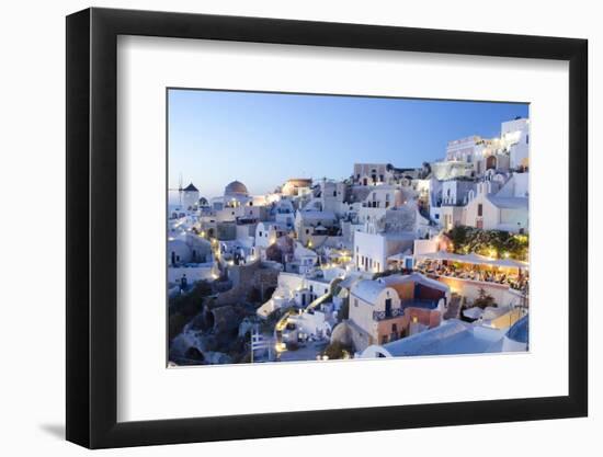 Greece, Santorini, Oia. white buildings and steep mountains at sunset.-Bill Bachmann-Framed Photographic Print