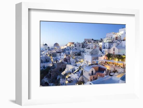 Greece, Santorini, Oia. white buildings and steep mountains at sunset.-Bill Bachmann-Framed Photographic Print