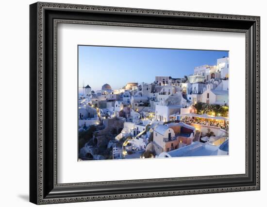 Greece, Santorini, Oia. white buildings and steep mountains at sunset.-Bill Bachmann-Framed Photographic Print