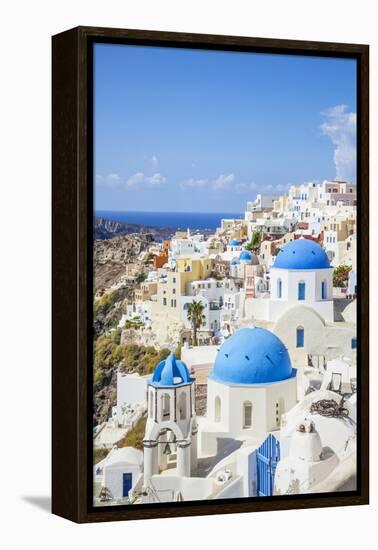 Greek Church with Three Blue Domes in the Village of Oia-Neale Clark-Framed Premier Image Canvas