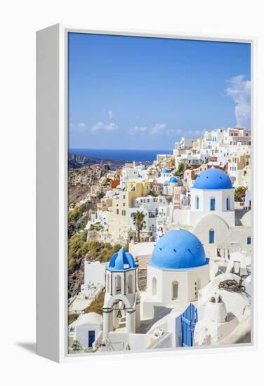 Greek Church with Three Blue Domes in the Village of Oia-Neale Clark-Framed Premier Image Canvas