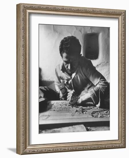 Greek Mountain Villager Engaged in Woodworking During the Winter-James Burke-Framed Photographic Print