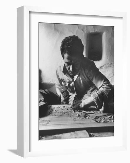 Greek Mountain Villager Engaged in Woodworking During the Winter-James Burke-Framed Photographic Print