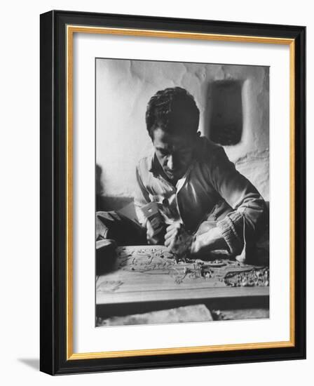 Greek Mountain Villager Engaged in Woodworking During the Winter-James Burke-Framed Photographic Print