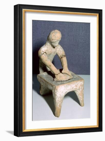 Greek terracotta of a woman making bread. Artist: Unknown-Unknown-Framed Giclee Print