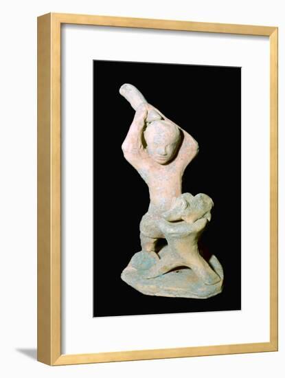 Greek terracotta statuette of a butcher with a pig. Artist: Unknown-Unknown-Framed Giclee Print