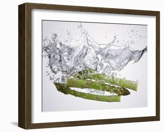 Green Asparagus Falling into Water-Kröger & Gross-Framed Photographic Print