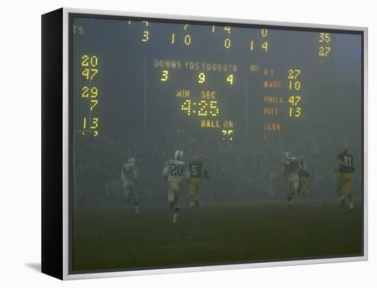 Green Bay Packers' Hornung Eluding Baltimore Colt's Defense to Score 5th Touchdown of Game, 1965-Art Rickerby-Framed Premier Image Canvas