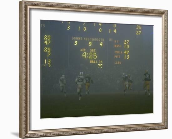 Green Bay Packers' Hornung Eluding Baltimore Colt's Defense to Score 5th Touchdown of Game, 1965-Art Rickerby-Framed Premium Photographic Print