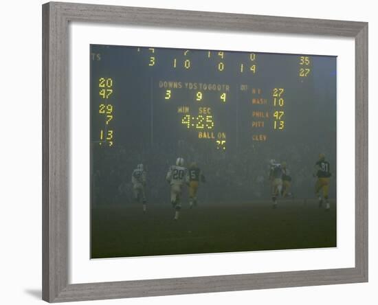 Green Bay Packers' Hornung Eluding Baltimore Colt's Defense to Score 5th Touchdown of Game, 1965-Art Rickerby-Framed Premium Photographic Print