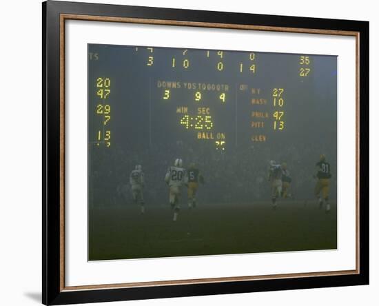 Green Bay Packers' Hornung Eluding Baltimore Colt's Defense to Score 5th Touchdown of Game, 1965-Art Rickerby-Framed Premium Photographic Print