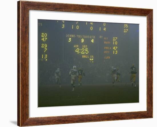 Green Bay Packers' Hornung Eluding Baltimore Colt's Defense to Score 5th Touchdown of Game, 1965-Art Rickerby-Framed Premium Photographic Print