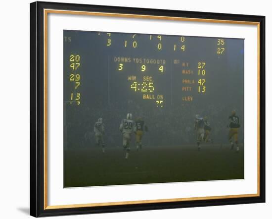 Green Bay Packers' Hornung Eluding Baltimore Colt's Defense to Score 5th Touchdown of Game, 1965-Art Rickerby-Framed Premium Photographic Print