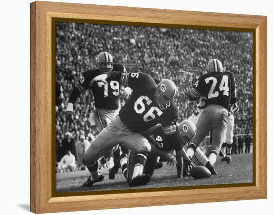 Green Bay Packers Playing a Game-George Silk-Framed Premier Image Canvas