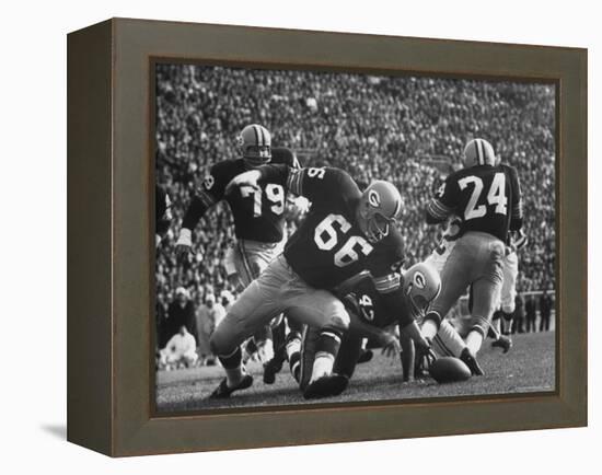Green Bay Packers Playing a Game-George Silk-Framed Premier Image Canvas