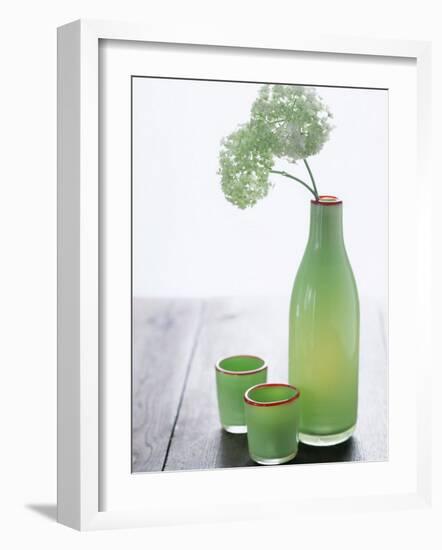 Green Bottle with Flowers and Green Glasses-Alena Hrbkova-Framed Photographic Print