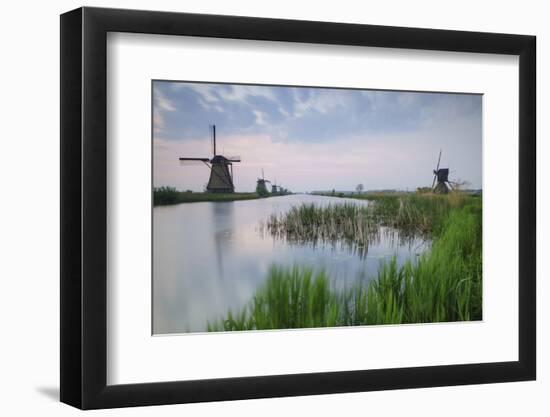 Green Grass Frames the Windmills Reflected in the Canal at Dawn, Netherlands-Roberto Moiola-Framed Photographic Print