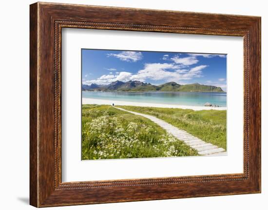 Green meadows and flowers surrounded by turquoise sea and fine sand, Ramberg, Lofoten Islands, Norw-Roberto Moiola-Framed Photographic Print