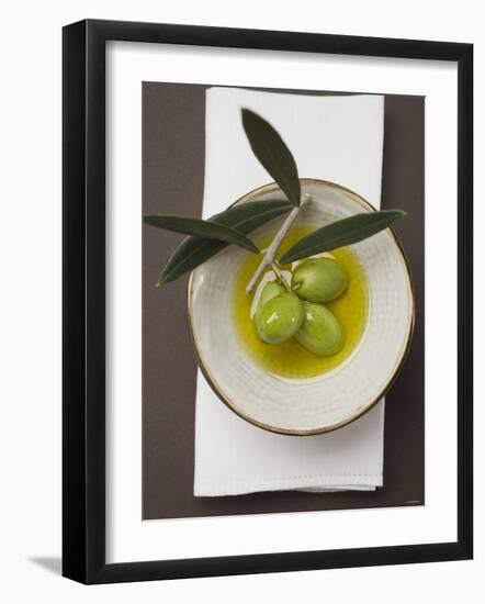 Green Olives on Twig in Bowl of Olive Oil-null-Framed Photographic Print