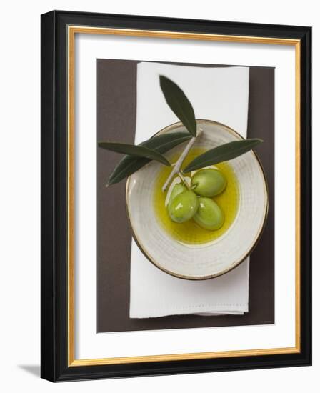 Green Olives on Twig in Bowl of Olive Oil-null-Framed Photographic Print