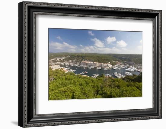 Green vegetation frames the medieval town and harbour, Bonifacio, Corsica, France, Mediterranean, E-Roberto Moiola-Framed Photographic Print