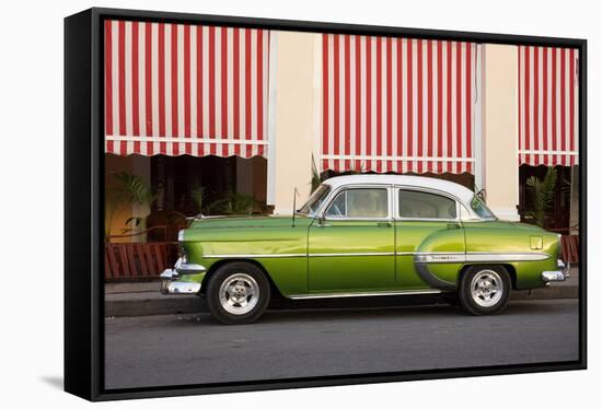 Green vintage American car parked in front of cafe, Cienfuegos, Cuba-Ed Hasler-Framed Stretched Canvas