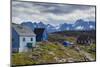 Greenland, Itilleq. Visitors exploring town.-Inger Hogstrom-Mounted Photographic Print