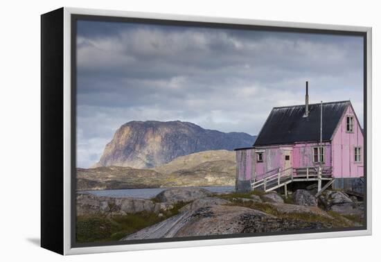 Greenland, Itilleq. Worn pink house.-Inger Hogstrom-Framed Premier Image Canvas