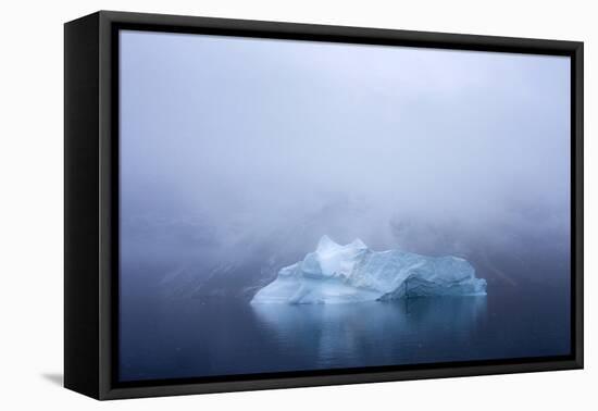 Greenland. Northeast Greenland National Park. Kong Oscar Fjord. Iceberg in dense fog.-Inger Hogstrom-Framed Premier Image Canvas