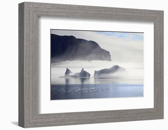 Greenland, Uummannaq. Morning fog envelopes Icebergs Uummannaq Fjord Bay-Miva Stock-Framed Photographic Print