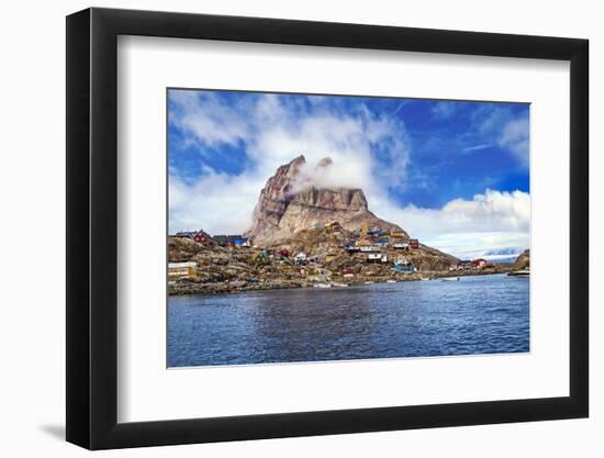 Greenland, Uummannaq. Uummannaq mountain (1170 m, 3839 ft) looms over the fishing village of Uumman-Miva Stock-Framed Photographic Print