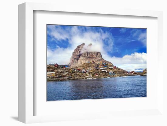 Greenland, Uummannaq. Uummannaq mountain (1170 m, 3839 ft) looms over the fishing village of Uumman-Miva Stock-Framed Photographic Print