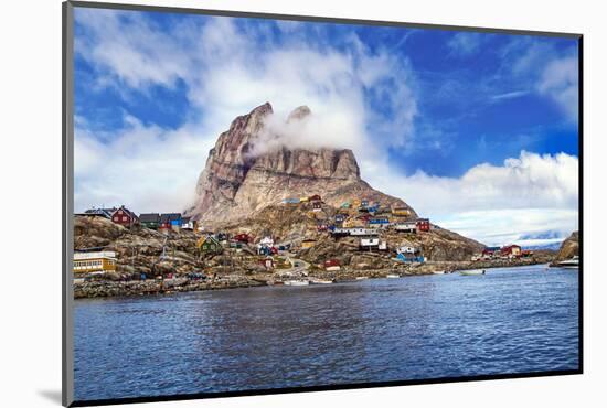 Greenland, Uummannaq. Uummannaq mountain (1170 m, 3839 ft) looms over the fishing village of Uumman-Miva Stock-Mounted Photographic Print