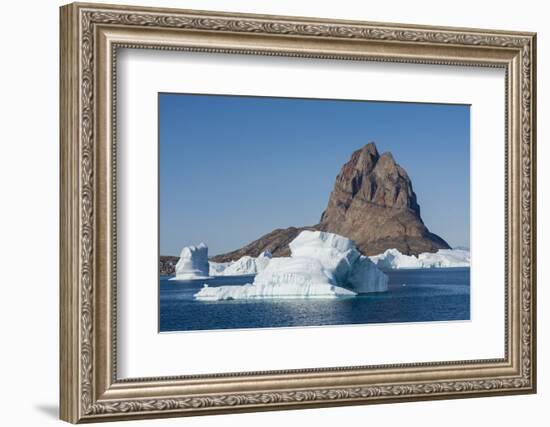 Greenland. Uummannaq. Uummannaq mountain and iceberg.-Inger Hogstrom-Framed Photographic Print