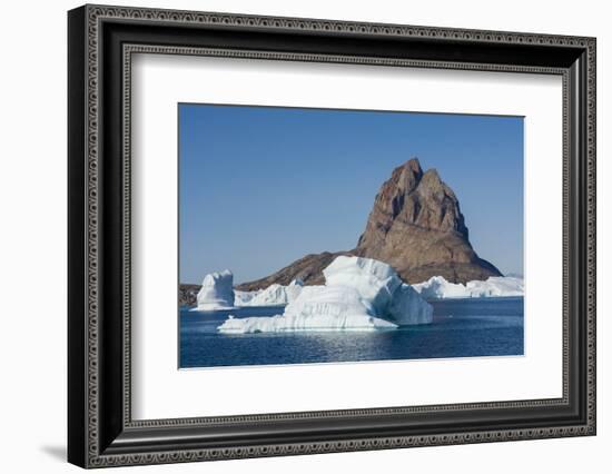 Greenland. Uummannaq. Uummannaq mountain and iceberg.-Inger Hogstrom-Framed Photographic Print