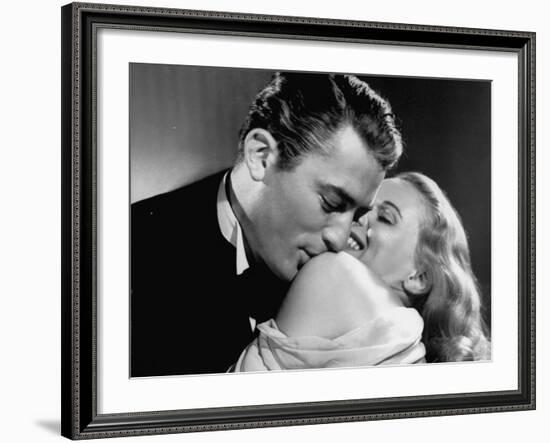 Gregory Peck Embracing Ann Todd in Publicity Still for Alfred Hitchcock's Film "The Paradine Case."-null-Framed Premium Photographic Print