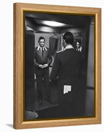 Gregory Peck Trying on Suit for His New Movie Man in the Grey Flannel Suit-Michael Rougier-Framed Premier Image Canvas