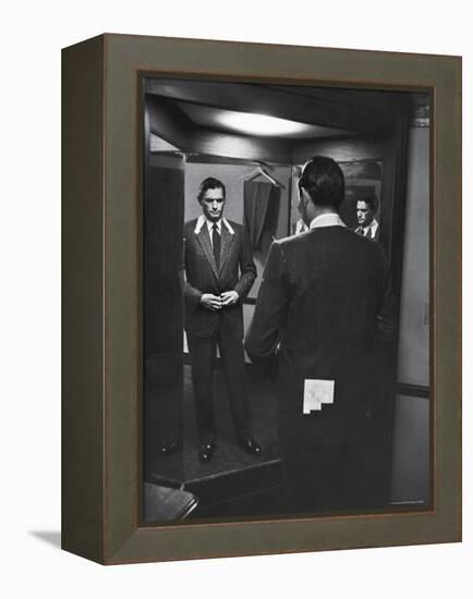 Gregory Peck Trying on Suit for His New Movie Man in the Grey Flannel Suit-Michael Rougier-Framed Premier Image Canvas