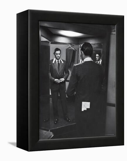 Gregory Peck Trying on Suit for His New Movie Man in the Grey Flannel Suit-Michael Rougier-Framed Premier Image Canvas